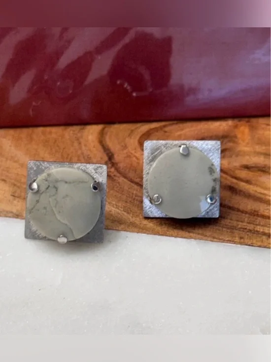 Vintage mid-century Destino cufflinks feature distinctive domed gray stones.