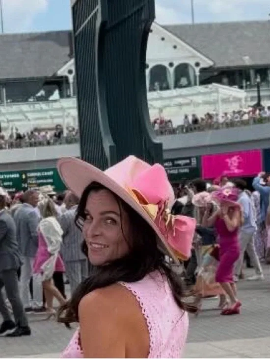 Judith March derby hat. Pink with pink bow, gold trim, and gold pony. Like new.