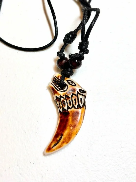 Reptile-Themed Brown Pendant.