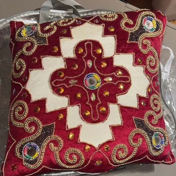 Elegant Red and White Embroidered Cushion