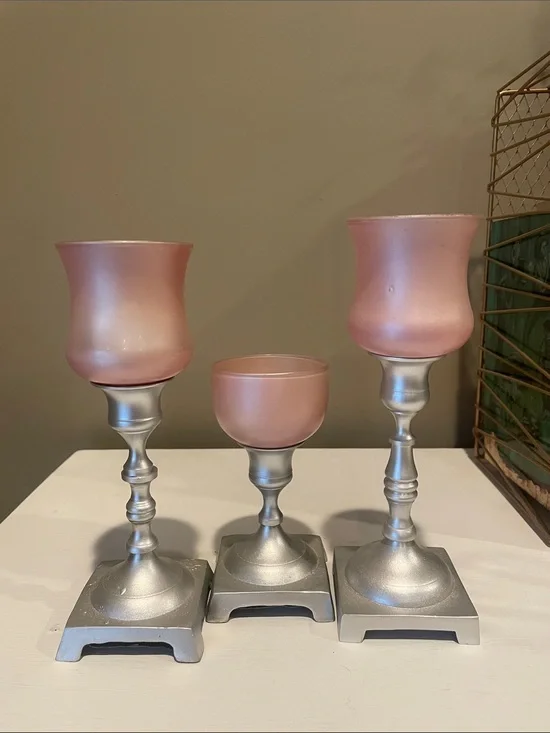 Silver base candlesticks with frost pink votive
