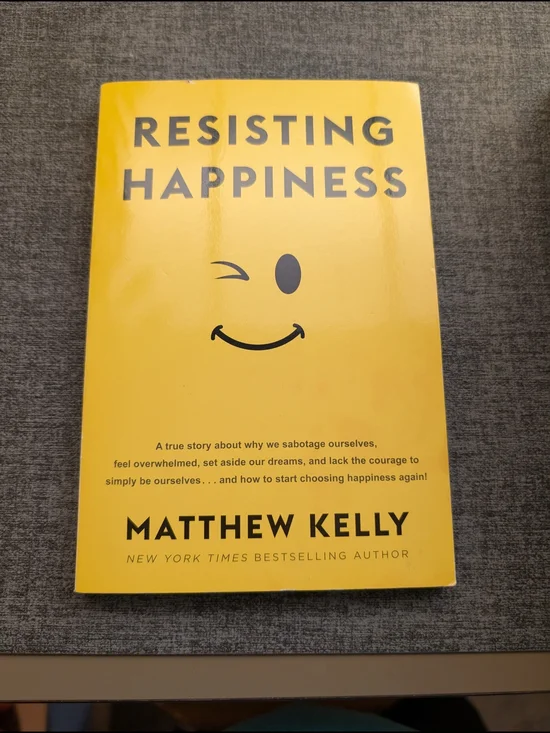Resisting Happiness by Matthew Kelly - Yellow Paperback