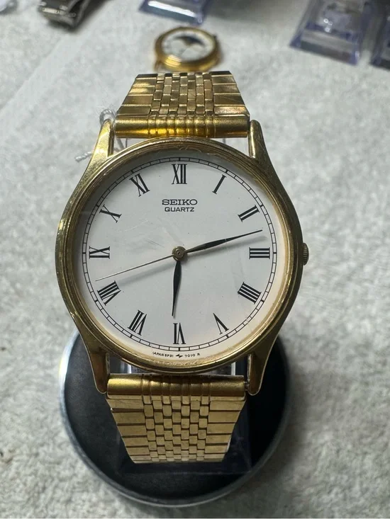 Seiko Gold and White Roman Numeral Dress Watch