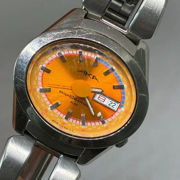 Vintage Seiko Alba AKA V743-5A10 Men's Quartz Watch Orange Dial 10BAR