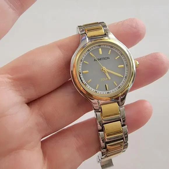 Armitron Womens Watch Gray Dial Silver Case Gold Bracelet Solar Quartz