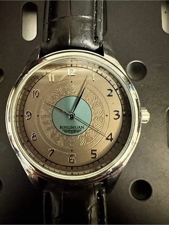 Men's Silver Watch with Black Leather Strap and Light Blue Dial Accent