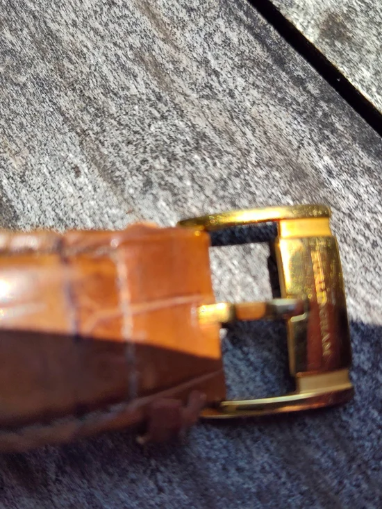 Men's Gold Tone Case With Brown Leather Strap with Open Heart Dial. 27 Jewels