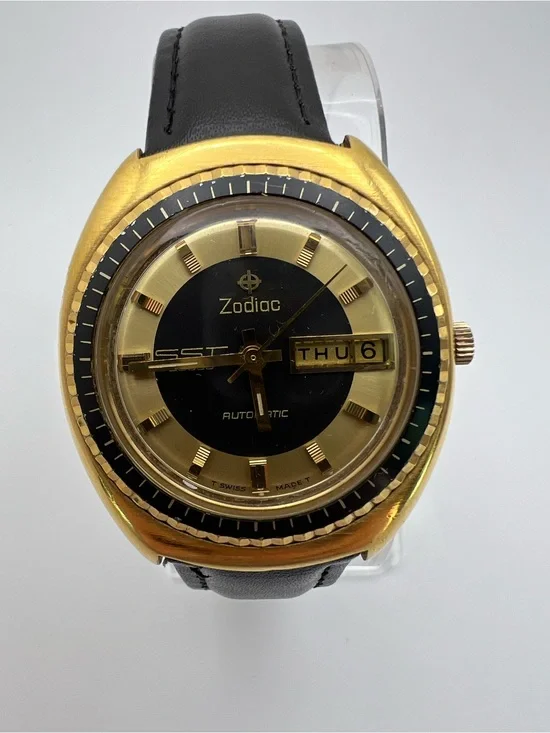 Zodiac Gold Tone Watch with Black Dial