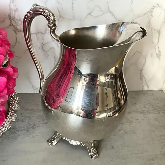 Vintage F. B. Rogers Silver Co. silver plated water pitcher with ice catch