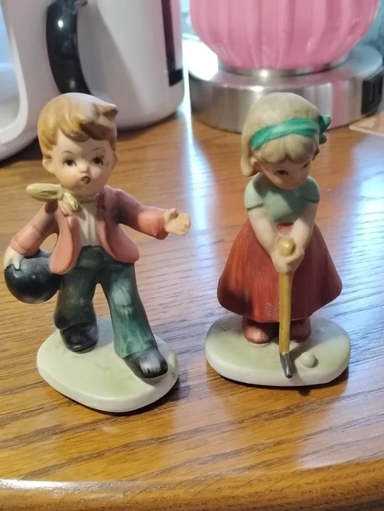 Hand-Painted Porcelain Boy and Girl Figurine Pair - Pastel Accents