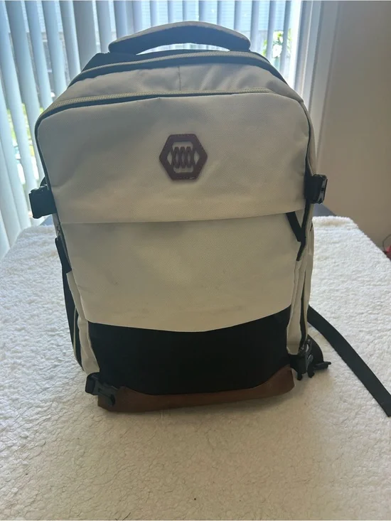 Canvas Two-Ton Cream Black & Brown Backpack with Charging Cable.