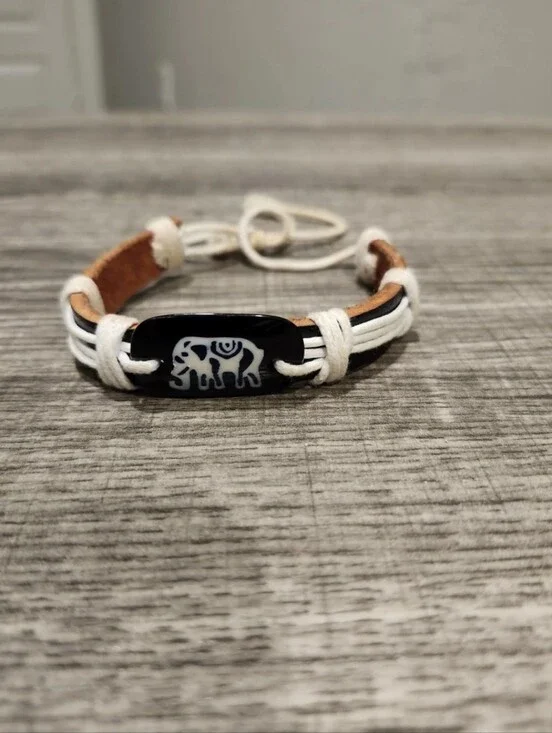 Brown And White Leather Bracelet W Black Elephant Bead And Adjustable Slide Bolo