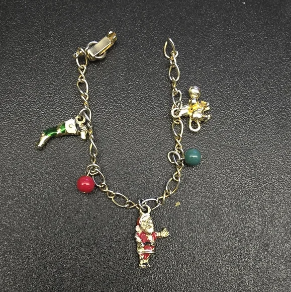Festive Gold Charm Bracelet with Santa and Colorful Accents