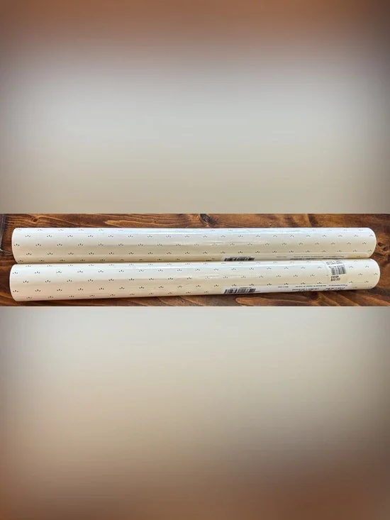 Two rolls of vintage wallpaper cream and dark green