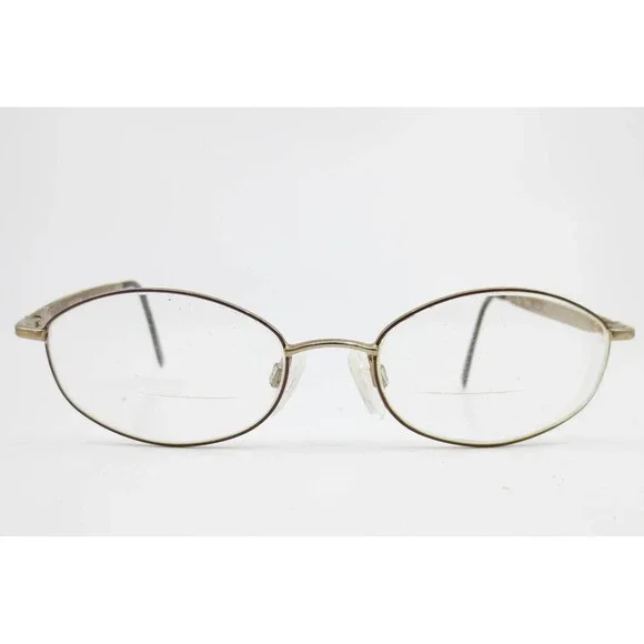 Revlon RV560 Smoked Topaz Oval Eyeglasses Floral Embossed Bronze Frames 130mm