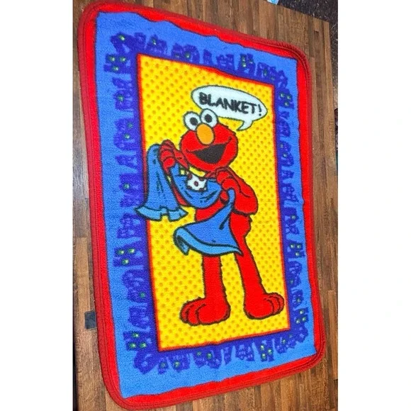 Vintage 90s Sesame Street Elmo crib blanket. Adventures of Elmo in Grouchland.
