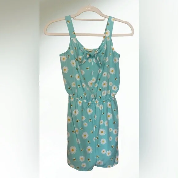 Lily Bleu Short romper in light blue aqua with white flowers and tie front.