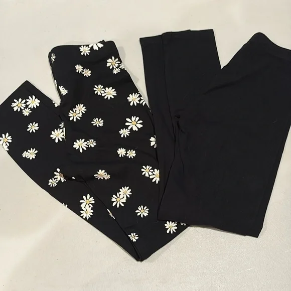 Old navy girls leggings.  size XL (14-16). Black and black with flowers