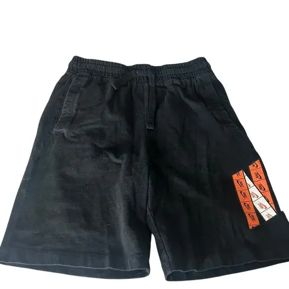 Nike boys large black cotton knit athletic shorts orange and white Nike logo