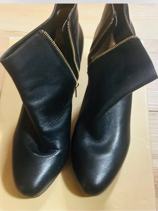 Michael Kors Sammy Platform Black Leather Ankle Booties with Gold Zipper.