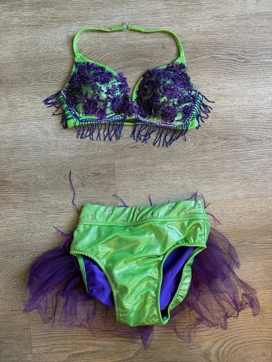 green and purple dance costume
