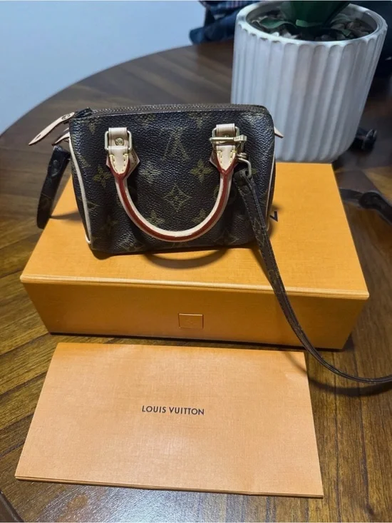 Louis Vuitton Monogram Mini Speedy Bandoulière in Brown with Natural Vachetta