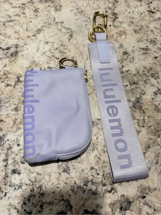 lululemon light lavender zip pouch with gold hardware