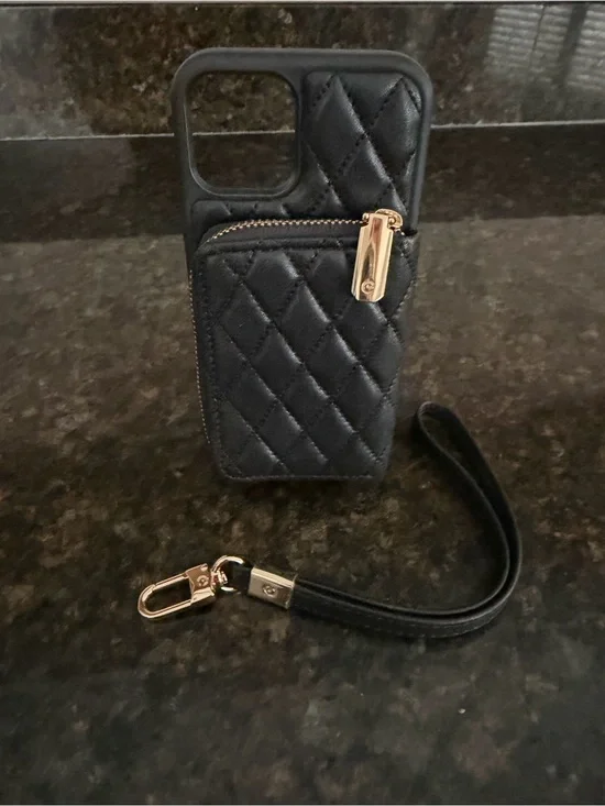 Quilted Black Wallet Phone Case with Gold detail.