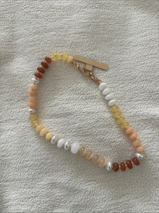 Anthro Multicolor Beaded phone charm / holder