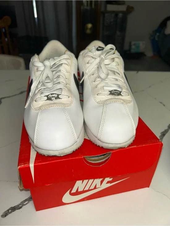 Nike White Leather Cortez Sneakers with Black Swoosh and Red Heel Tab