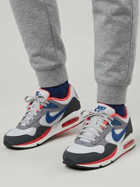 Nike Air Sneakers - Gray, Red, and Blue size 8