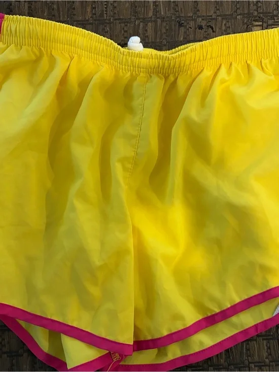 Nike Yellow Athletic Shorts with Pink Trim