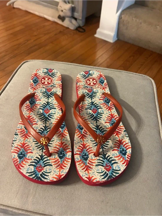 Tory Burch Orange Strappy Flip Flops with Multicolor Floral Footbed